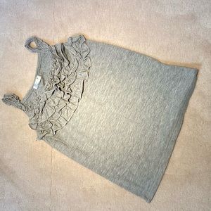 I am selling and adorable gray (11-12 years) blouse for girls just new